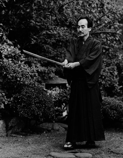 Practice with a wooden sword from Master Ueshiba