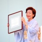 After receiving an award from URL, 2012